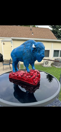 The red white and blue buffalo statue