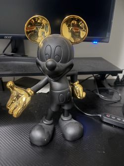 Gold and black Mickey Mouse collectible