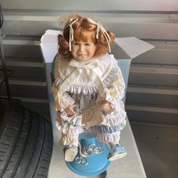 Porcelain Doll With Chair