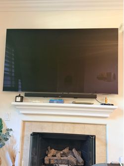 Bose ultra smart soundbar with with mounting brackets and remote. Like NEW