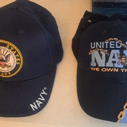 two dark blue Navy Baseb Caps