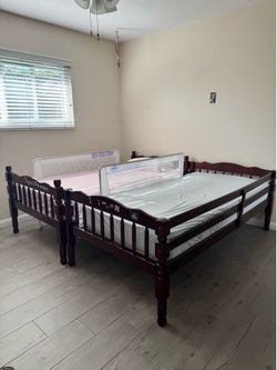 Two twin beds with two mattresses