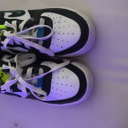 Nike Air Force 1 LV8 GS 'Graffiti' sneakers in a White, Laser Blue, Volt, and Black colorway