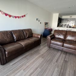 Brown leather couch set