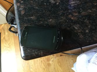 Samsung phone/ car charger/ and charger included