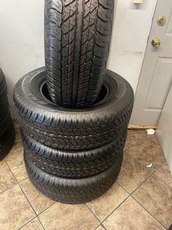 SET FOUR GOOD USED TIRES 265/70/17 SEMI NEW 95%TREAD LIFE $250 PRICE INCLUDES PROFESSIONAL INSTALLATION AND TAX