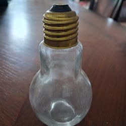 vintage-style glass novelty jar shaped like an incandescent light bulb,