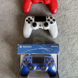 red, white and blue DualShock 4 controllers