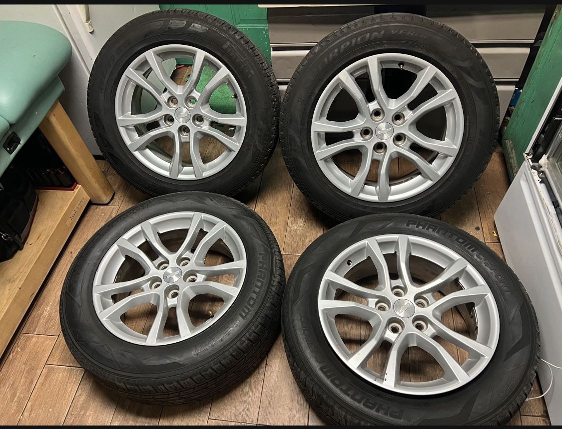 450$ 4 Rims with Tires 235/60/18 good condition For Chevy Camaro Lug Pattern 5x120