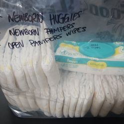 28 Newborn Diapers - Huggies/Pampers