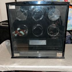 6-watch winder with extra storage, featuring a sleek black finish and a digital interface.