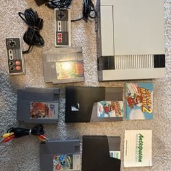 Nintendo NES + 5 Games (hablo Espanol)