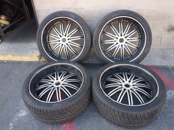 24 inch black rims and good tires. 6 lug Chevy, GMC, Caddy