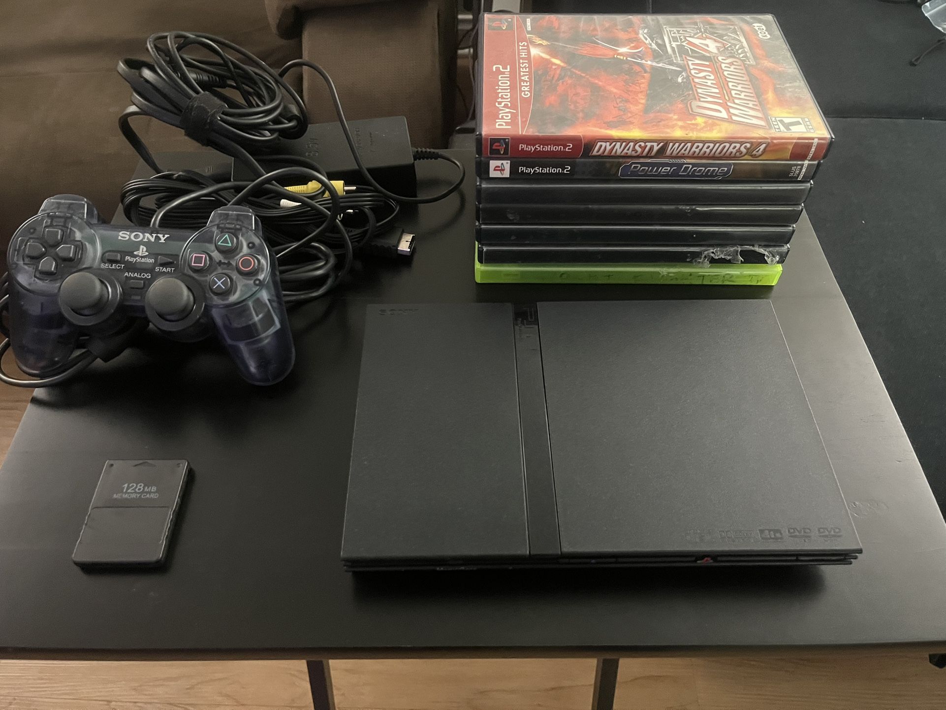Excellent Condition PlayStation 2 Slim With Games Bundle