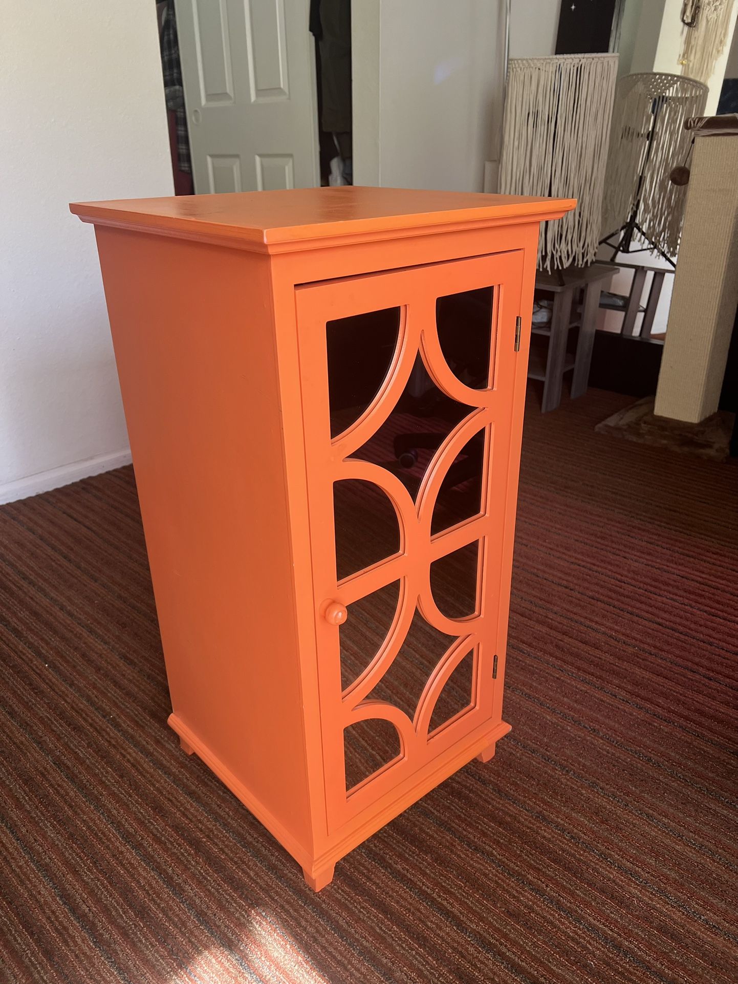 Bright Orange Cabinet with Mirrored Door