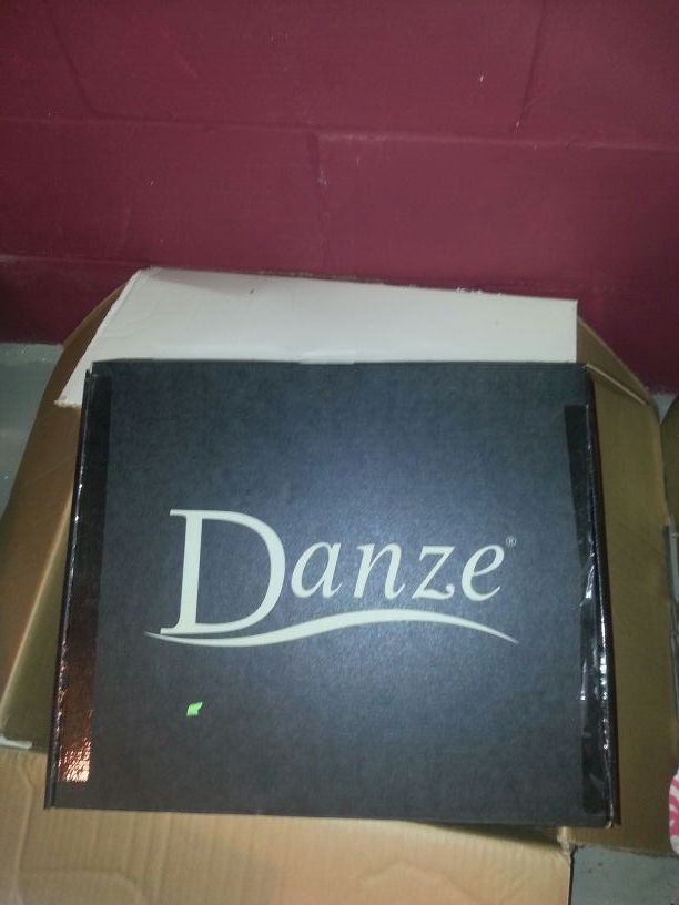 Stainless kitchen faucet. .new in the box