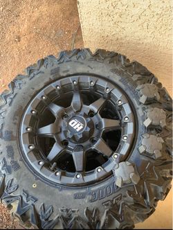 Can-Am 14" STI HD Wheels & 27" Sedona Rip Saw Tires Set (4x137) w/ OEM Center Caps