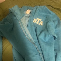 blue zip up