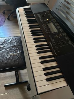 Used Casio CTK-4400 Piano with chair