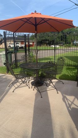 Patio table 4 chairs and umbrella