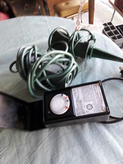 Out door electric power conection and timmer.