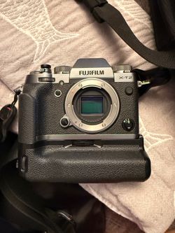 Fujifilm X-T2 Camera with XF 56mm f/1.2 Lens, Battery Grip, lowepro camera backpack, accessories.