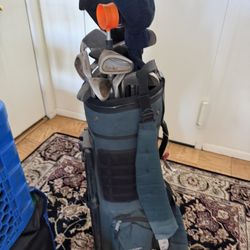 Golf Clubs + Bag On Wheels