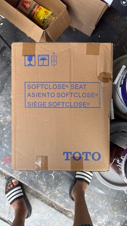Toto, soft close, elongated toilet seat.