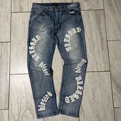 Blue/white distressed denim jeans with a grunge vibe (Blessed)