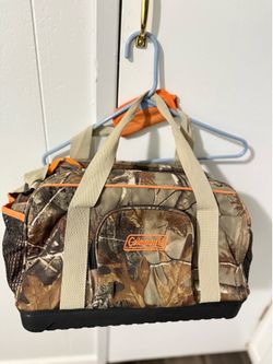 Coleman Cooler - Hard Bottom, soft sided, double zipper. Works great.