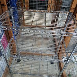 Steel Shelve With Wheels, Height 34 Inches,  Wide 22 1/4 Inches,  Deep 13 Inches. 