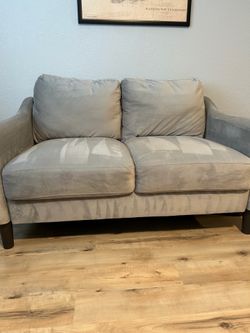 Gray velvet love seat
