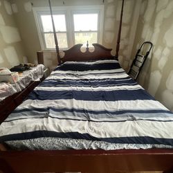 Free Queen Bed  (mattress, sheets  not included)