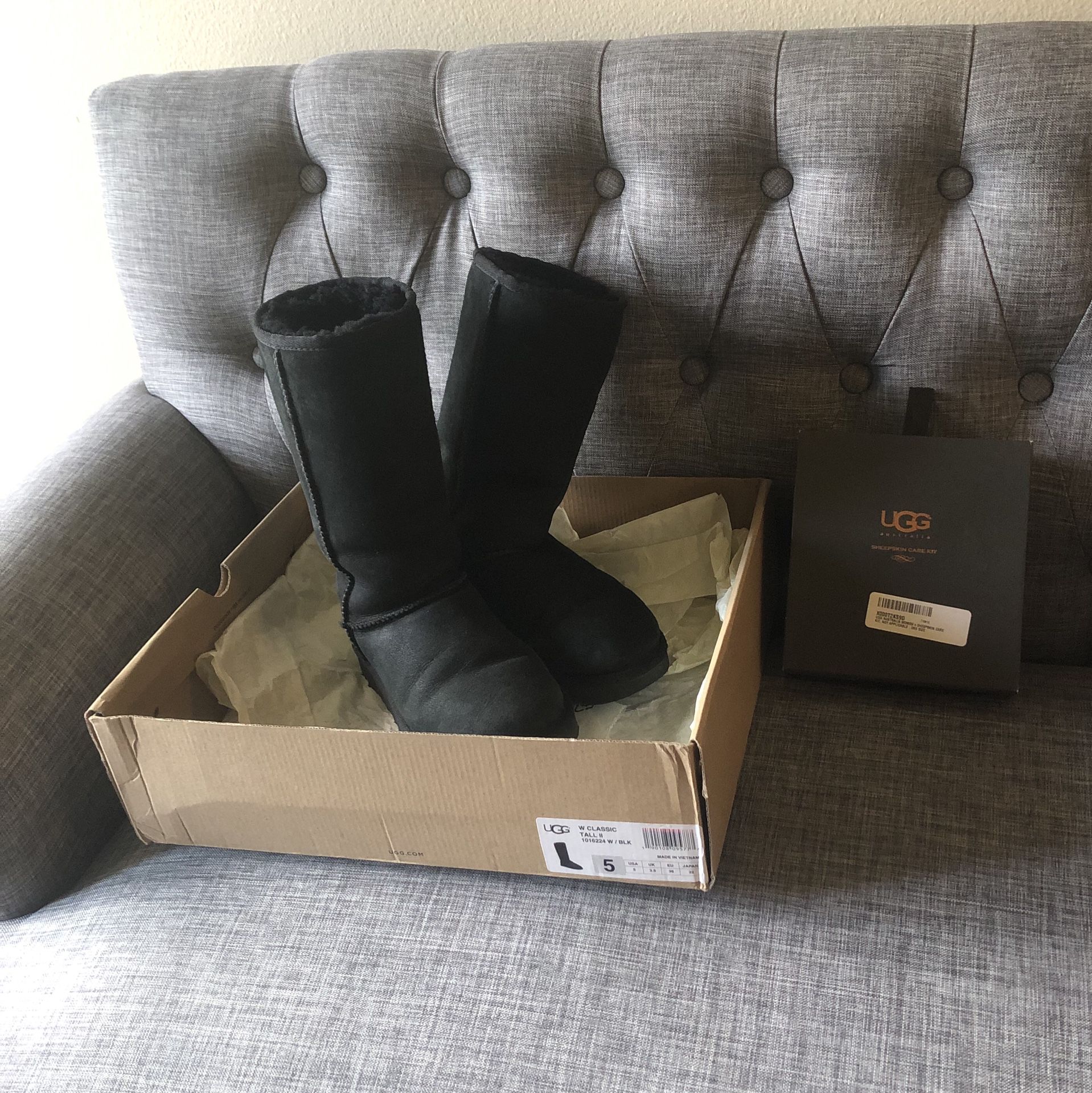Uggs Classic Tall II black size 5 with sheepskin care kit