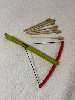 Child size wooden crossbow.