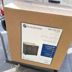 
Glacier Bay
Delridge 31 in. Single Sink Chocolate Bath Vanity with Caramel Cultured Marble Top (Assembled)