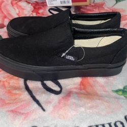 Vans Classic Slip-On shoes in all black canvas. 