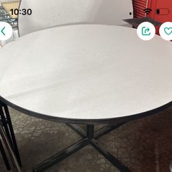 Round Table & 4 Chairs. 