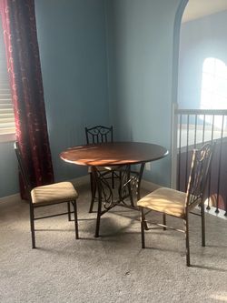 Round Wood and Metal Dining Table with Chairs