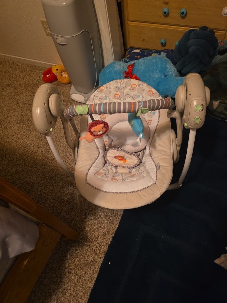 Swing, Cheetah Carrier, Baby Bullet Food Maker, And Mickey Mouse Umbrella Stroller, Bottles And Breast Milk Storage Bottles Glass And Plastic.