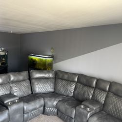 Couch and 75” TV