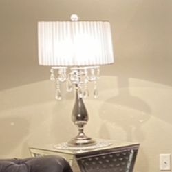 Elegance, diamond lamps, and end tables floating glass