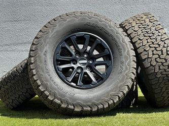 OEM 17" Ford F150 Wheels Black F-150 Rims 6x135mm BFGoodrich 35" AT Tires FX4 XLT Tremor Raptor