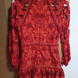 Scarlet red  floral lace dress with blouson sleeves.