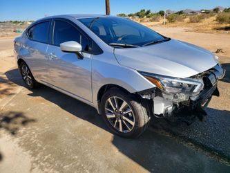 Nissan Versa/Runs And Drive Great/Very low Miles