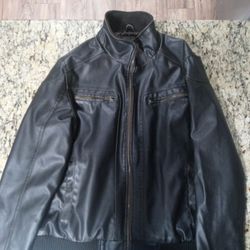 Guess 100% Genuine leather from Wilsons leather. Brown mens size XL