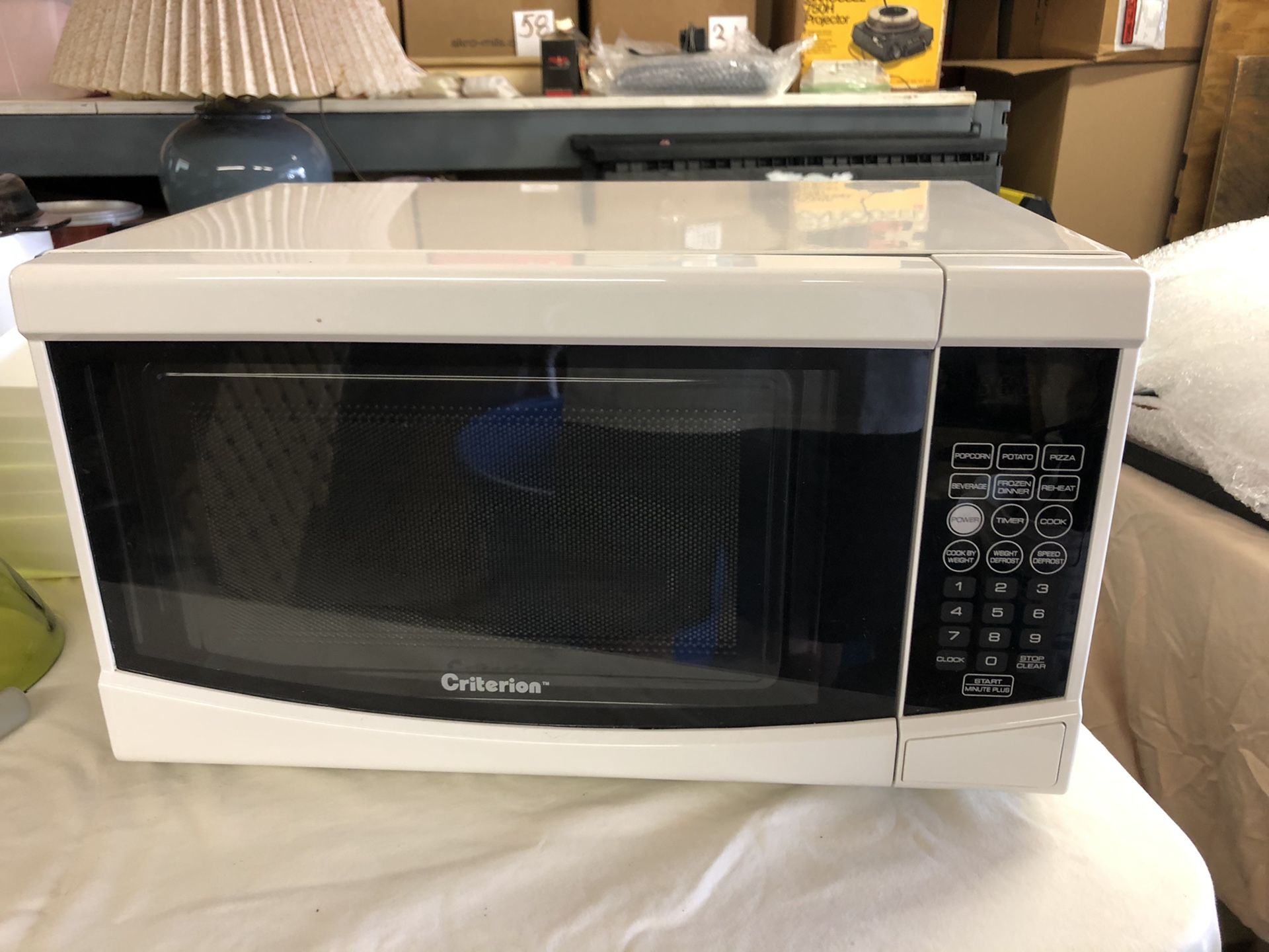 Criterion® 0.7 cu.ft. White Countertop Microwave