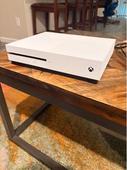 Xbox 1s with games and power cord