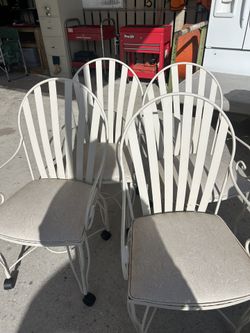 4 Vintage Chairs On Wheels 