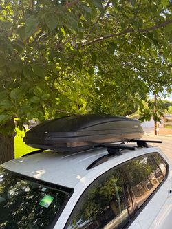 Thule Evolution 1600 cargo box, with racks and locks
